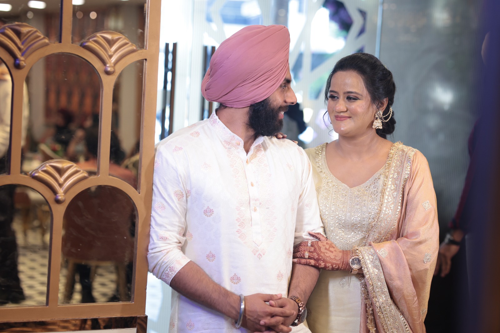 The couple sharing a smile
