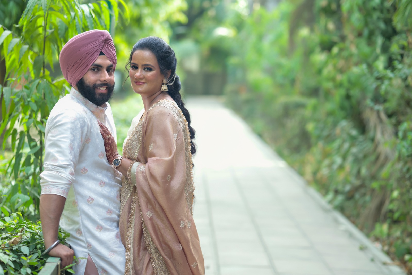 The couple on a garden path